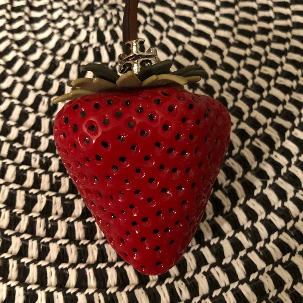 Authentic New with tag. Tory Burch Red Strawberry bag charm.